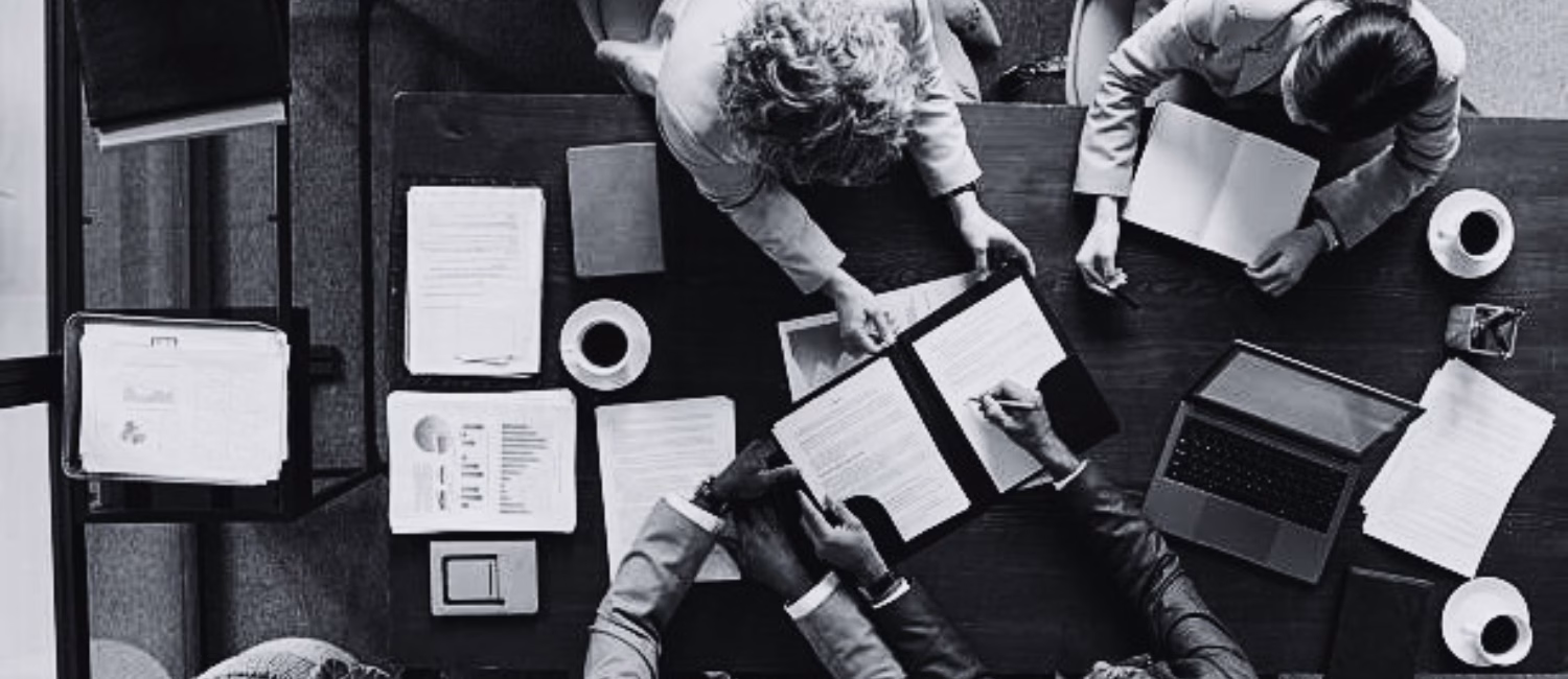 https://media.istockphoto.com/id/2231181721/photo/multiethnic-middle-aged-executives-discussing-documents-during-office-brainstorming.jpg?b=1&s=612x612&w=0&k=20&c=ik0TWX0YtK13ekvD5s8FMsUN4E-eaoHD3SzL9IMgUjY=